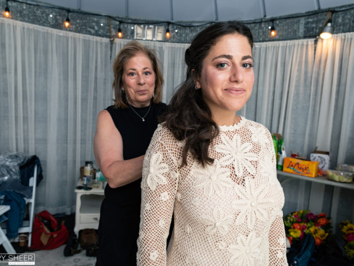 Denver Co bride being helped by mother © Gary Sheer Photography