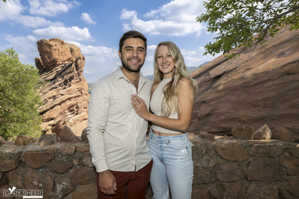 Denver couple in up-close engagement photo with rocks in background